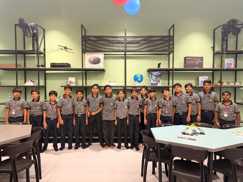 Students line up posing in classroom lab