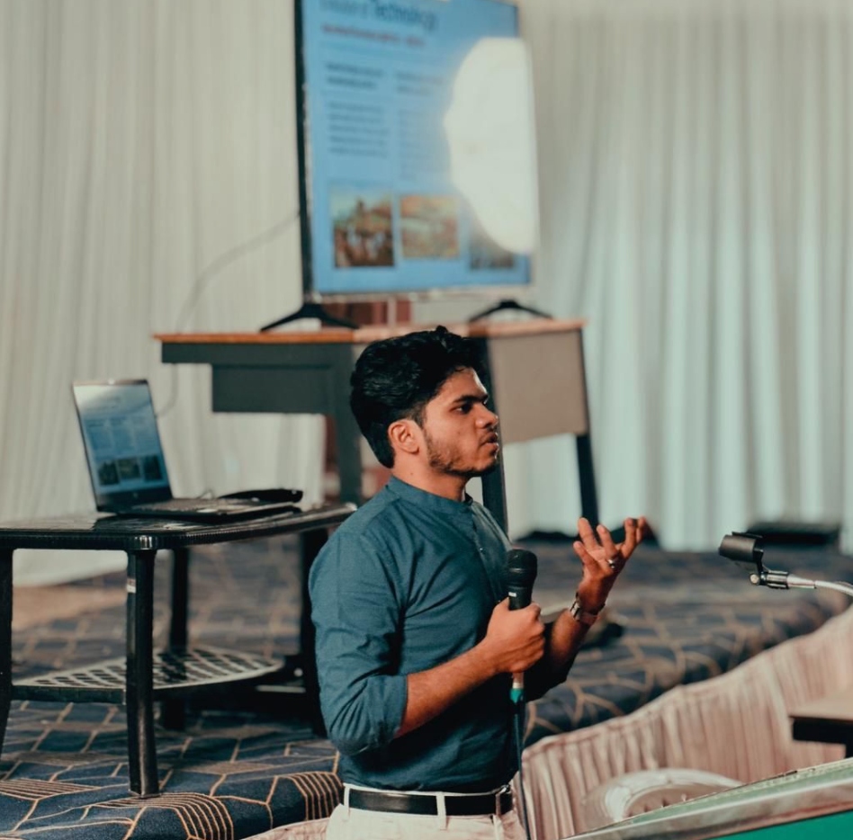 Adhil presenting AI concept